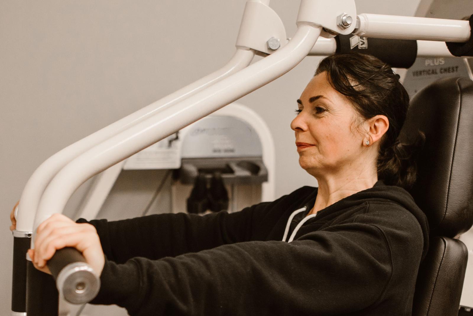 Women doing a chest press during a workout